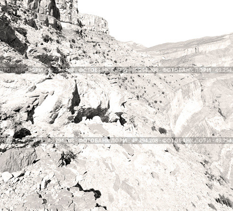  gorge and canyon the deep cloudy sky   in oman the old  mountain . Стоковое фото, агентство Ingram Publishing / Фотобанк Лори