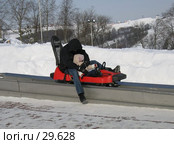 Катание на тобогане утомило или усыпило? Стоковое фото, фотограф Fro / Фотобанк Лори