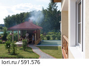 Открытая веранда возле коттеджа. Стоковое фото, фотограф Юрий Синицын / Фотобанк Лори