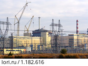 Волгодонская (Ростовская) атомная электростанция, строящийся второй энергоблок. Вид с пруда-охладителя АЭС. Стоковое фото, фотограф A Челмодеев / Фотобанк Лори