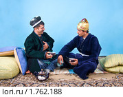 Таджик показывает уважение к гостю (2010 год). Стоковое фото, фотограф Анатолий Ефимов / Фотобанк Лори