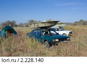 Машины с лодками на багажнике. Стоковое фото, фотограф Олег Хархан / Фотобанк Лори