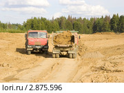 Два самосвала (2011 год). Редакционное фото, фотограф Наталия Шевченко / Фотобанк Лори