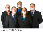 Портрет деловых людей с заклеенными лентой ртами. Стоковое фото, фотограф Monkey Business Images / Фотобанк Лори