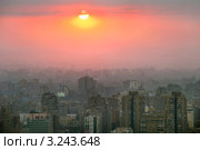 Закат солнца над городом Каиром, Египет (2012 год). Редакционное фото, фотограф Николай Винокуров / Фотобанк Лори