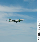 Самолет Boeing 737-8K2 компании "Transavia Airlines" набирает высоту (2012 год). Редакционное фото, фотограф Виктор Карасев / Фотобанк Лори