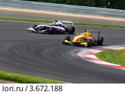 Болид Формула 2.0 участвует в чемпионате "Мировая серия Renault" на треке "Moscow Raceway" в Подмосковье (2012 год). Редакционное фото, фотограф Николай Винокуров / Фотобанк Лори