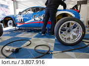 Автомобиль Ferrari 458 российской команды  Esta Motorsports участвует в Чемпионате Европы FIA GT3 на трассе Moscow Raceway в Подмосковье (2012 год). Редакционное фото, фотограф Николай Винокуров / Фотобанк Лори