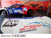 Техническое обслуживание автомобиля Ferrari 458 команды Russian Bears участвует в Чемпионате Eвропы FIA GT3 на трассе Moscow Raceway в Подмосковье (2012 год). Редакционное фото, фотограф Николай Винокуров / Фотобанк Лори