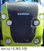 Трактор AXION 930 CLAAS. Агропромышленная выставка «Агротехнологии-2013» в выставочном центре «ВертолЭкспо». Ростов-на-Дону. Редакционное фото, фотограф Олег Пчелов / Фотобанк Лори