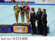 Чемпионат Европы по спортивной гимнастике 2013 года. Москва, СК "Олимпийский". Победители состязаний на бревне - Лариса Йордаке (Larisa Iordache), Диана Булимар (Diana Bulimar) и Анастасия Гришина (Anastasia Grishina) Редакционное фото, фотограф Игорь Долгов / Фотобанк Лори