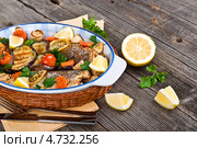 Морской окунь, запеченный с овощами. Стоковое фото, фотограф Анастасия Мелешкина / Фотобанк Лори