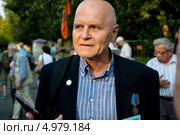 Михаил Шнейдер, защитник Белого дома, секретарь политсовета "Солидарности" на митинге памяти событий 1991 года в Москве (2013 год). Редакционное фото, фотограф Николай Винокуров / Фотобанк Лори