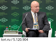 Юрий Кобаладзе - старший советник банка UBS, советский журналист и разведчик, генерал-майор СВР в отставке, профессор МГИМО и радиообозреватель на Международной выставке вооружения, военной техники и боеприпасов RAE-2013 г. Нижний Тагил. Редакционное фото, фотограф Игорь Долгов / Фотобанк Лори