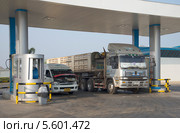 Заправка автомобилей сжиженным газом (LPG) в Таиланде (2014 год). Редакционное фото, фотограф Виктор Карасев / Фотобанк Лори