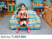 Девочка играет в детском саду (2014 год). Редакционное фото, фотограф Куликова Вероника / Фотобанк Лори