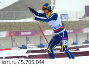 Лыжница Iryna Bui (Украина) выступает на Зимних Паралимпийских играх в Сочи (2014 год). Редакционное фото, фотограф Анна Мартынова / Фотобанк Лори