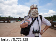 Турист с билетом в храм Байон. Камбоджа (2012 год). Редакционное фото, фотограф Светлана Чуйкова / Фотобанк Лори