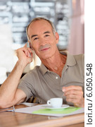 Man enjoying a coffee. Стоковое фото, фотограф Phovoir Images / Фотобанк Лори