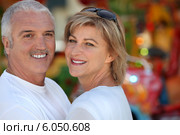 Two adults at funfair. Стоковое фото, фотограф Phovoir Images / Фотобанк Лори