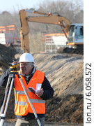 surveyor on a building site. Стоковое фото, фотограф Phovoir Images / Фотобанк Лори