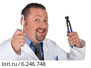 A dentist with his tools. Стоковое фото, фотограф Phovoir Images / Фотобанк Лори