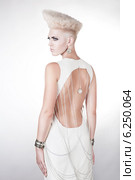 futuristic beautiful woman in dress with creative hairstyle. Стоковое фото, фотограф Александр Буц / Фотобанк Лори