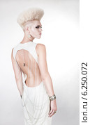 futuristic beautiful woman in white dress with creative hairstyle. Стоковое фото, фотограф Александр Буц / Фотобанк Лори
