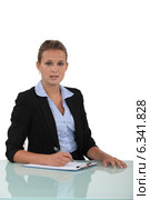 businesswomanat her desk. Стоковое фото, фотограф Phovoir Images / Фотобанк Лори