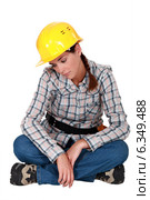 Sad female builder. Стоковое фото, фотограф Phovoir Images / Фотобанк Лори
