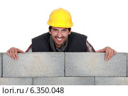 Man with a wicked grin. Стоковое фото, фотограф Phovoir Images / Фотобанк Лори