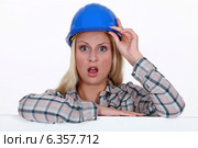 Craftswoman looking very surprised. Стоковое фото, фотограф Phovoir Images / Фотобанк Лори