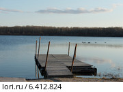 Pier in a lake, Manitoba, Canada. Стоковое фото, агентство Ingram Publishing / Фотобанк Лори