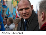 Олимпийский чемпион и депутат Госдумы Александр Карелин на во главе колонны шествия в рамках акции "Мы едины" в российский праздник День народного единства на Тверской улице, Москва 4 ноября 2014. Редакционное фото, фотограф Николай Винокуров / Фотобанк Лори