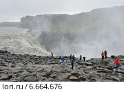 Водопад Деттифосс (исл. Dettifoss) на реке Йёкульсау-ау-Фьёдлум в дождливую погоду, Исландия (2014 год). Стоковое фото, фотограф Овчинникова Ирина / Фотобанк Лори
