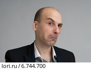 Бизнесмен скептически поднял бровь. Стоковое фото, фотограф Александр Лычагин / Фотобанк Лори