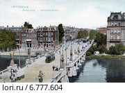 Мост Hogesluis через реку Амстел и улица Sarphatistraat в Амстердаме. Голландия. Стоковое фото, фотограф Юрий Кобзев / Фотобанк Лори