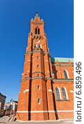 Колокольня католического костела Успения Пресвятой Девы Марии (1897 г.) в г. Лодзь, Польша. Архитектор Konstanty Wojciechowski (2014 год). Стоковое фото, фотограф Иван Марчук / Фотобанк Лори