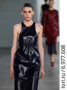NEW YORK, NY - SEPTEMBER 11: Model Serena Archetti walk the runway at the Calvin Klein Collection fashion show during MBFW Spring 2015 at Spring Studios on September 11, 2014 in NYC. Редакционное фото, фотограф Anton Oparin / Фотобанк Лори