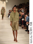 NEW YORK, NY - SEPTEMBER 11: A model walks the runway at Ralph Lauren fashion show during Mercedes-Benz Fashion Week Spring 2015 on September 11, 2014 in New York City. Редакционное фото, фотограф Anton Oparin / Фотобанк Лори