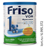 Молочная смесь Friso VOM 1 с пробиотиками на белом фоне (2015 год). Редакционное фото, фотограф M.G / Фотобанк Лори