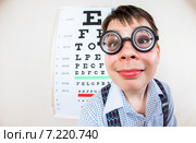 Person wearing spectacles in an office at the doctor. Стоковое фото, фотограф Андрей Армягов / Фотобанк Лори