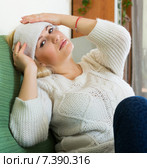 Tired woman sitting on sofa. Стоковое фото, фотограф Яков Филимонов / Фотобанк Лори