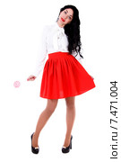 Beautiful young woman in a white blouse and a red skirt. Стоковое фото, фотограф Art Konovalov / Фотобанк Лори