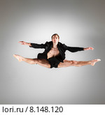 The young attractive modern ballet dancer jumping on white background. Стоковое фото, фотограф Volodymyr Melnyk / PantherMedia / Фотобанк Лори