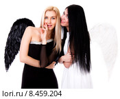 Black angel take counsel with a white angel. Стоковое фото, фотограф Art Konovalov / Фотобанк Лори