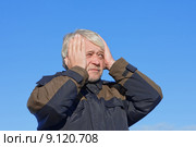 Portrait of middle-aged man on blue sky . Стоковое фото, фотограф Roberts Ratuts / PantherMedia / Фотобанк Лори