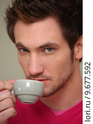 man drinking coffee. Стоковое фото, фотограф Phovoi R. / PantherMedia / Фотобанк Лори