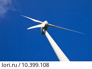 Windmill against a blue sky. Стоковое фото, фотограф Artur Wojteczek / PantherMedia / Фотобанк Лори