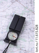 Pocket compass lying on a map. Стоковое фото, фотограф pascal coupry / PantherMedia / Фотобанк Лори
